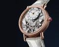 The House presents a worldwide exclusive glimpse at a new version of its Tradition Dame model, radiantly attired in rose gold :: Breguet