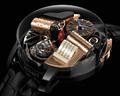 Movement: Mechanical hand-wound, exclusive Jacob & Co. JCFM02 calibre, 646 components, 52 jewels, 21,600 vib/h, 120° rotation in 20 seconds, tri-axial tourbillon (rotating in 40 seconds, 3 and 8 minutes respectively), two cylinders in contact with two combs, each with 15 blades, miniature dancing couple in the centre, 72-hour power reserve :: JACOB & CO.
