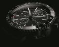The Chronoliner by Breitling is ready for takeoff in a new version teaming its high-tech ceramic bezel with a black steel case, along with a matching dial and rubber strap. :: BREITLING